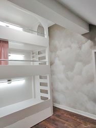 Bunk bed design with custom made mural cloud paintings.