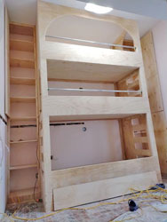 Bunk bed design assembled with fine premium plywood, with shelvings and cabinets.