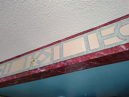 Onyx red marble ceiling corners.
