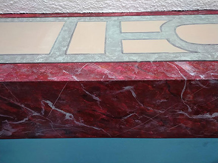 Onyx red marble ceiling corners.