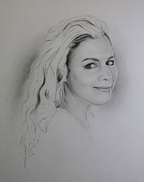 Charcoal portrait drawing and sketching process six - accenting and blending lines.